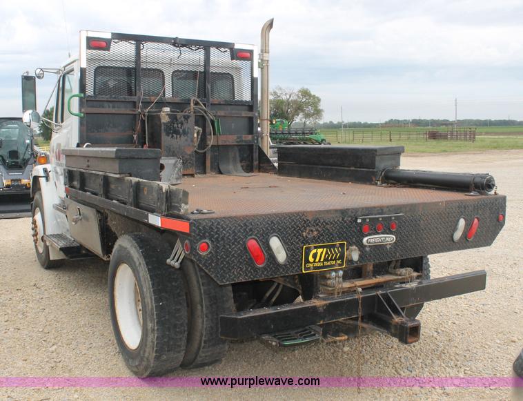 image for item AJ9378 1997 Freightliner FL70 flatbed truck