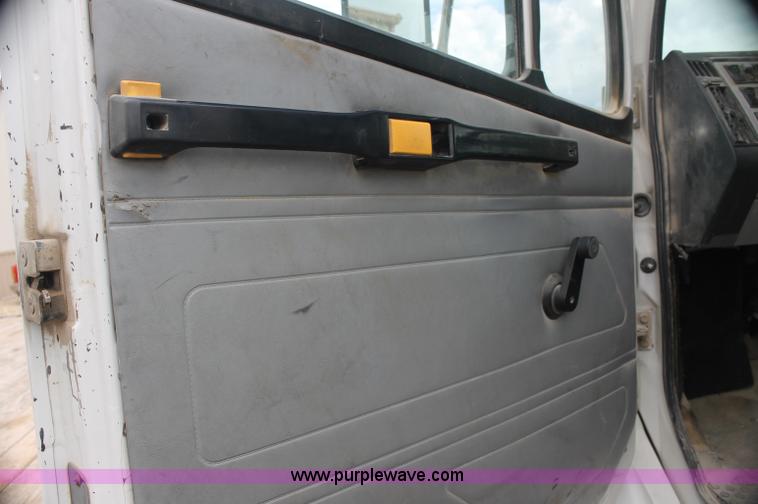 image for item AJ9378 1997 Freightliner FL70 flatbed truck