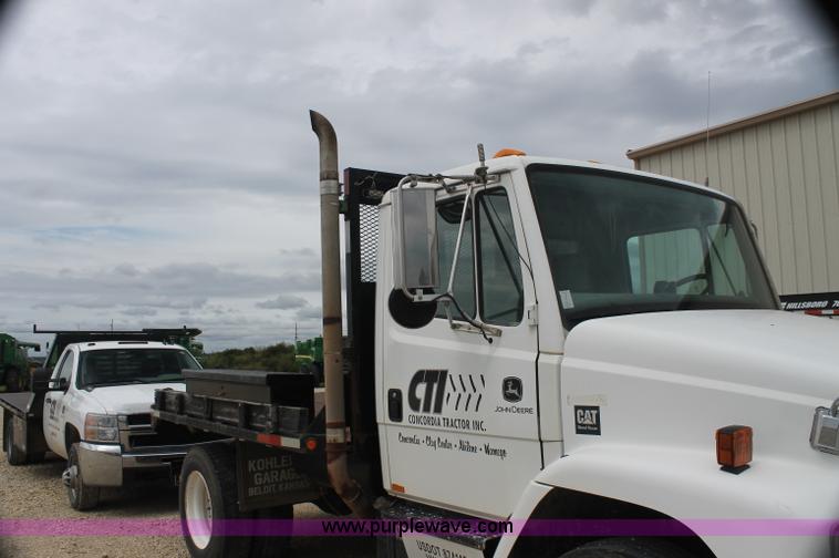 image for item AJ9378 1997 Freightliner FL70 flatbed truck