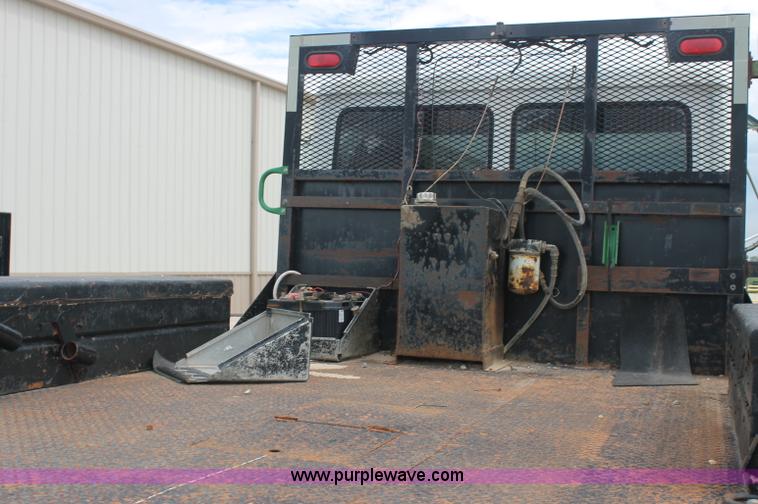 image for item AJ9378 1997 Freightliner FL70 flatbed truck