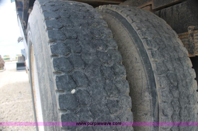 image for item AJ9378 1997 Freightliner FL70 flatbed truck