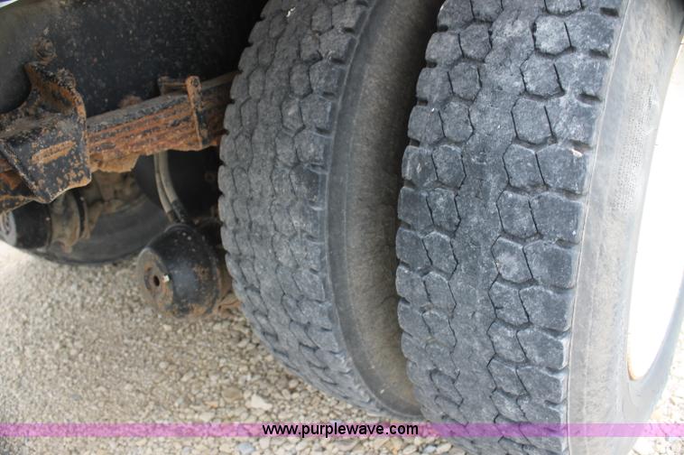 image for item AJ9378 1997 Freightliner FL70 flatbed truck