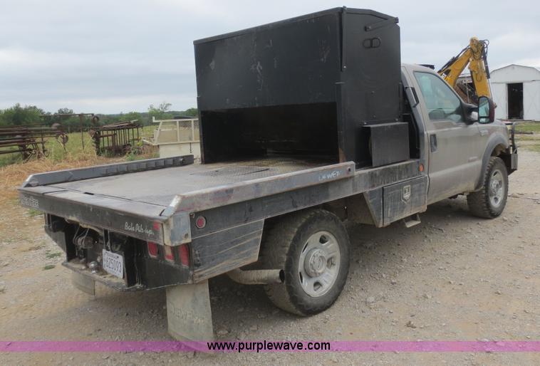 image for item D2150 2005 Ford F350 Super Duty XLT flatbed pickup truck
