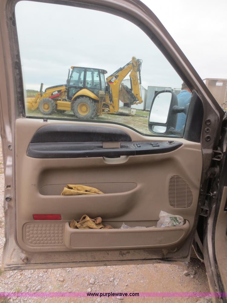 image for item D2150 2005 Ford F350 Super Duty XLT flatbed pickup truck