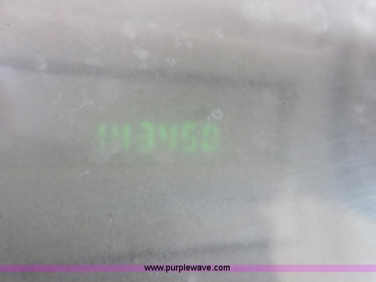 image for item D2150 2005 Ford F350 Super Duty XLT flatbed pickup truck