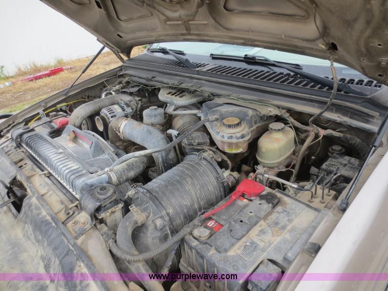 image for item D2150 2005 Ford F350 Super Duty XLT flatbed pickup truck