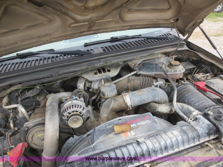 image for item D2150 2005 Ford F350 Super Duty XLT flatbed pickup truck