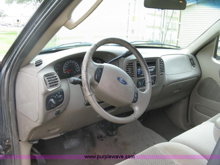 image for item E7891 2003 Ford F150 SuperCrew pickup truck