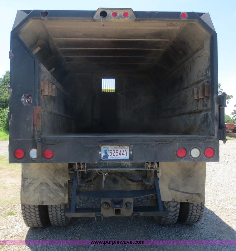 image for item F8291 1998 International 4700 chip bed truck