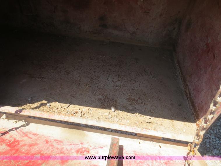 image for item F8291 1998 International 4700 chip bed truck