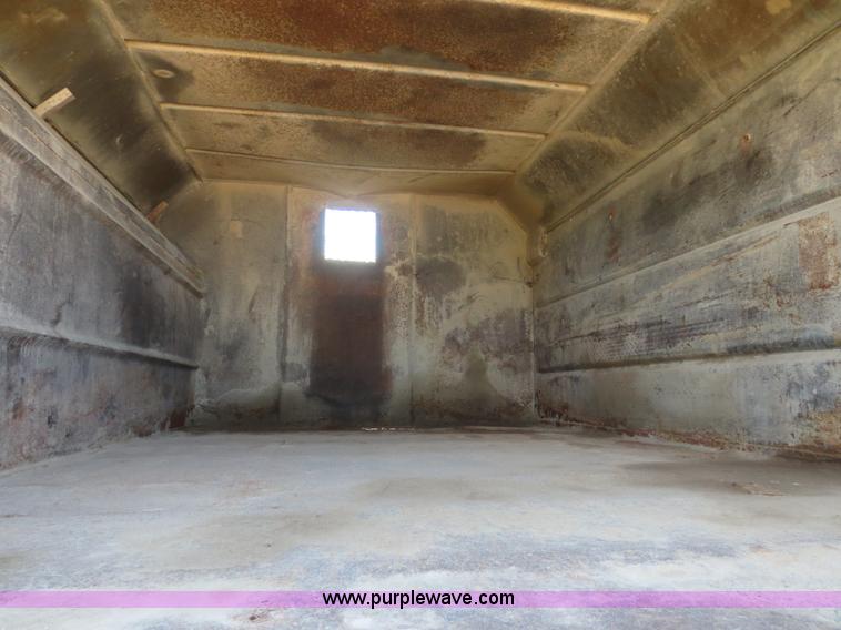 image for item F8291 1998 International 4700 chip bed truck