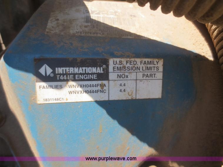 image for item F8291 1998 International 4700 chip bed truck