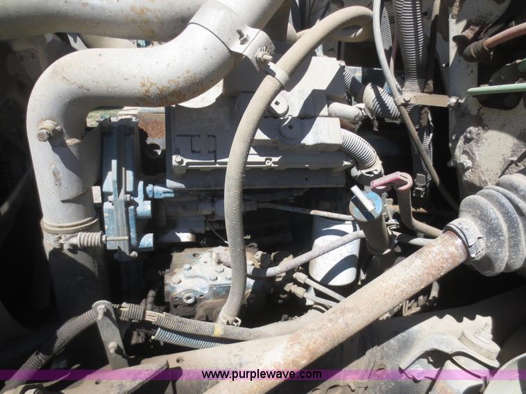 image for item I2226 1999 International 4700 refuse truck