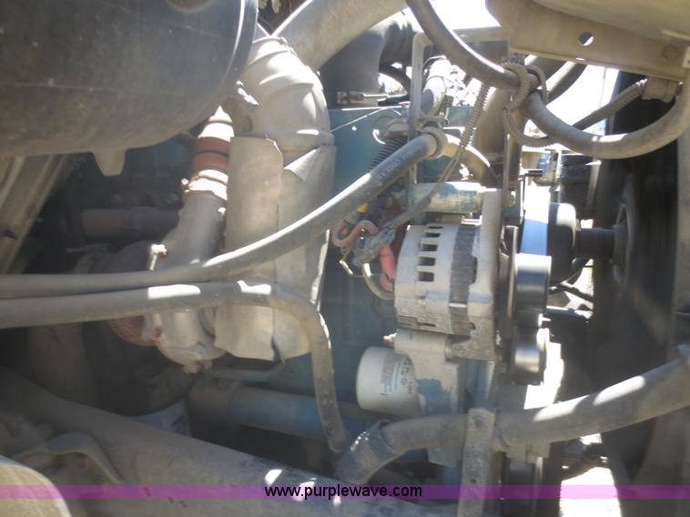 image for item I2228 1999 International 4700 refuse truck