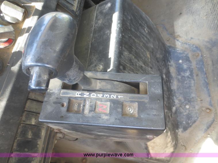 image for item I2228 1999 International 4700 refuse truck