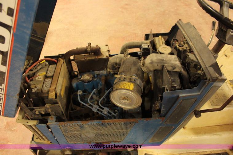 image for item J2038 Ford LGT140 lawn mower