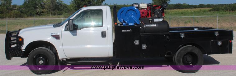 image for item J2071 2008 Ford F350 XL flatbed truck