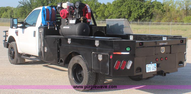 image for item J2071 2008 Ford F350 XL flatbed truck
