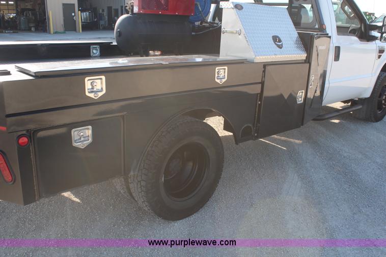 image for item J2071 2008 Ford F350 XL flatbed truck
