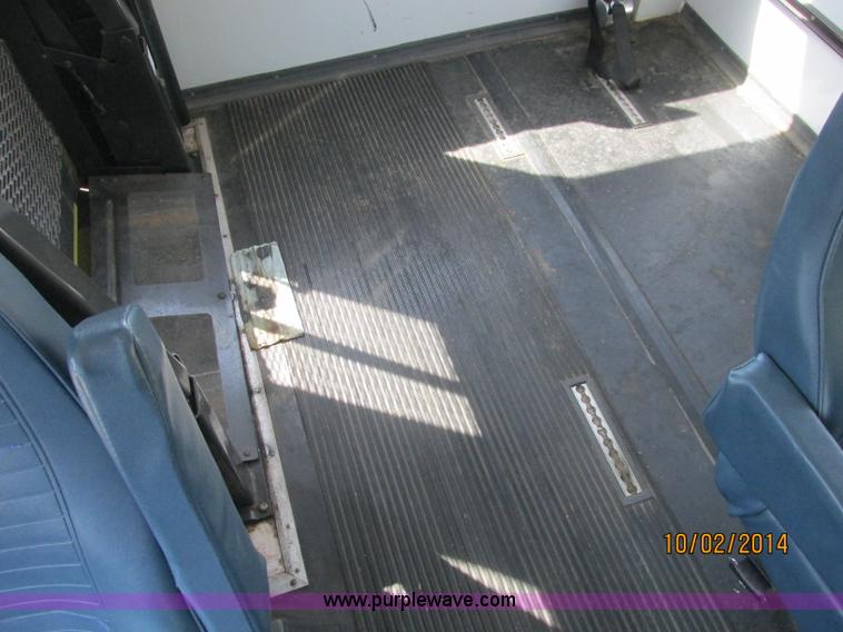 image for item J2454 2003 Ford E350 Super Duty Startrans bus