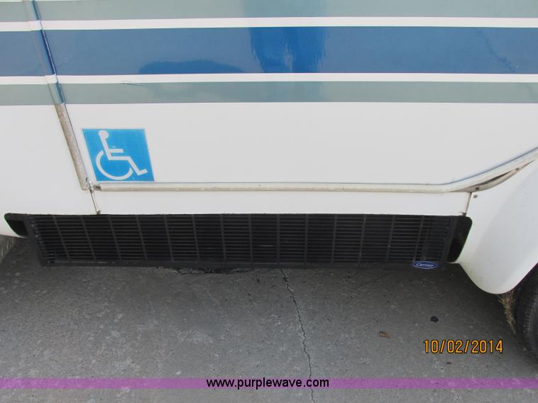 image for item J2454 2003 Ford E350 Super Duty Startrans bus