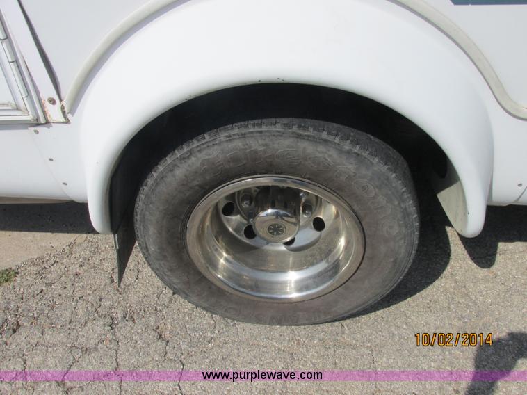 image for item J2454 2003 Ford E350 Super Duty Startrans bus