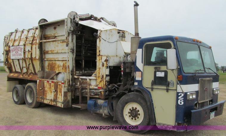 image for item J3474 1991 Peterbilt 320 recycling refuse truck