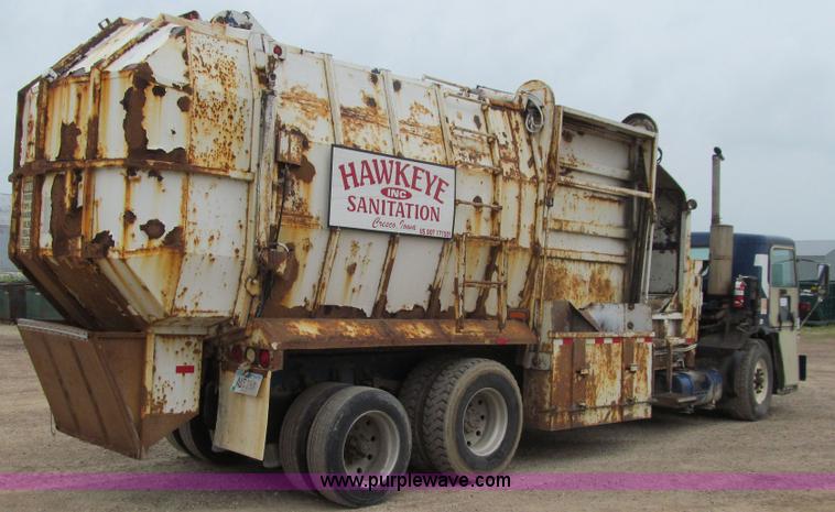 image for item J3474 1991 Peterbilt 320 recycling refuse truck