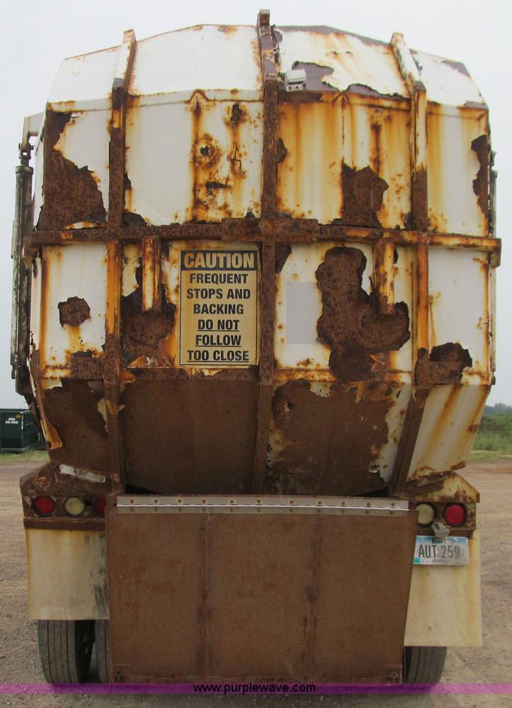 image for item J3474 1991 Peterbilt 320 recycling refuse truck