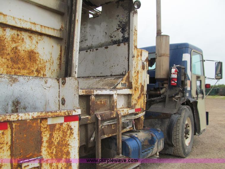 image for item J3474 1991 Peterbilt 320 recycling refuse truck
