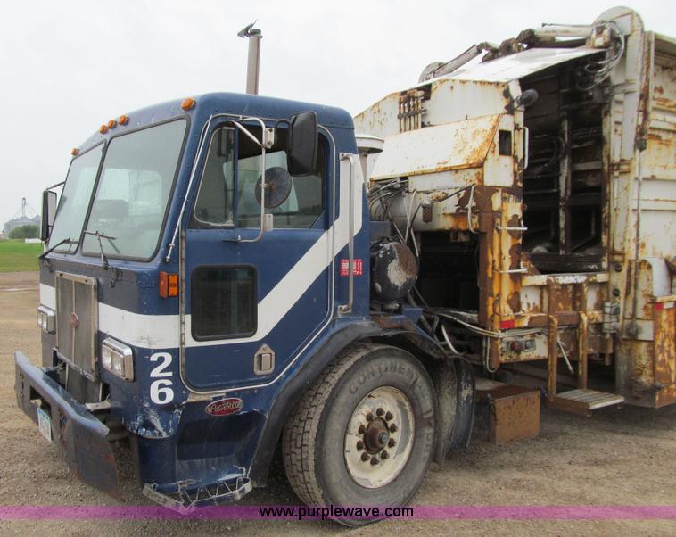 image for item J3474 1991 Peterbilt 320 recycling refuse truck