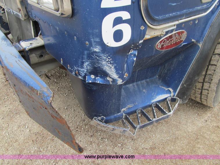 image for item J3474 1991 Peterbilt 320 recycling refuse truck