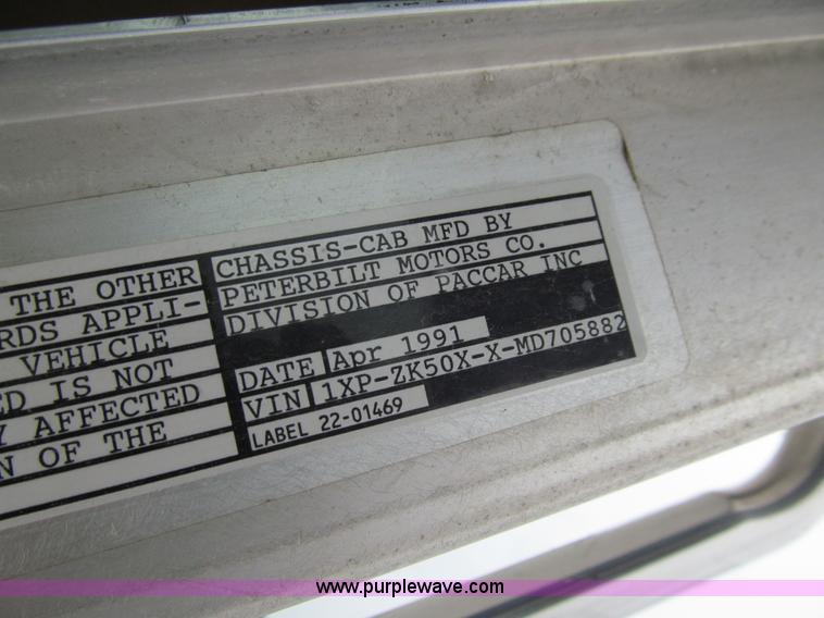 image for item J3474 1991 Peterbilt 320 recycling refuse truck