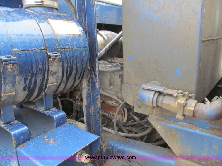 image for item J3474 1991 Peterbilt 320 recycling refuse truck