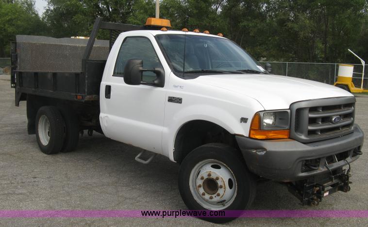 image for item E7877 2000 Ford F450 Super Duty XL flatbed truck