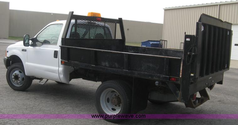 image for item E7877 2000 Ford F450 Super Duty XL flatbed truck
