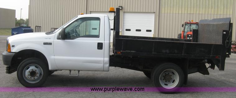 image for item E7877 2000 Ford F450 Super Duty XL flatbed truck
