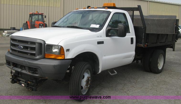 image for item E7877 2000 Ford F450 Super Duty XL flatbed truck