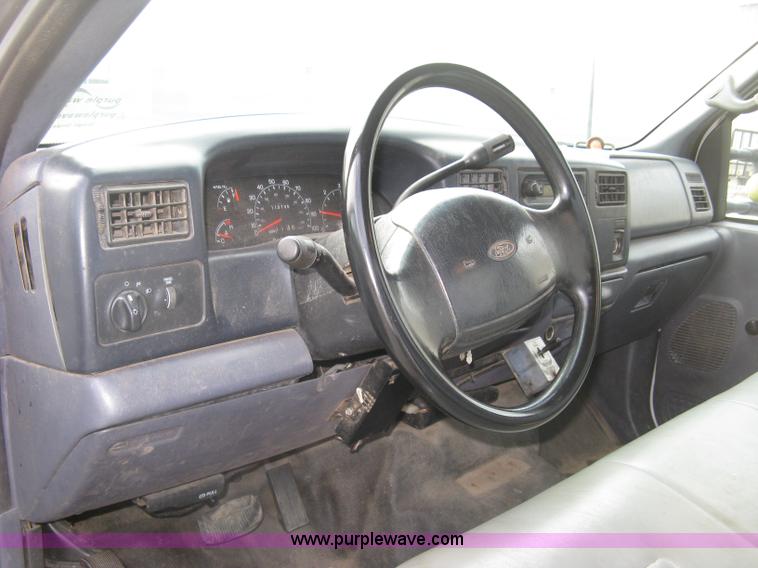 image for item E7877 2000 Ford F450 Super Duty XL flatbed truck