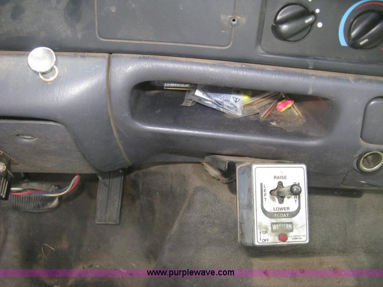 image for item E7877 2000 Ford F450 Super Duty XL flatbed truck