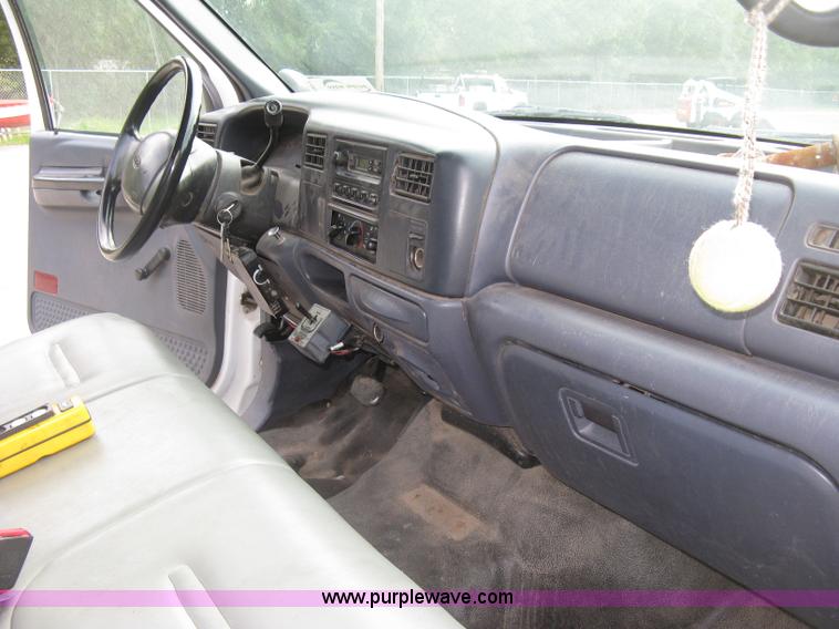 image for item E7877 2000 Ford F450 Super Duty XL flatbed truck