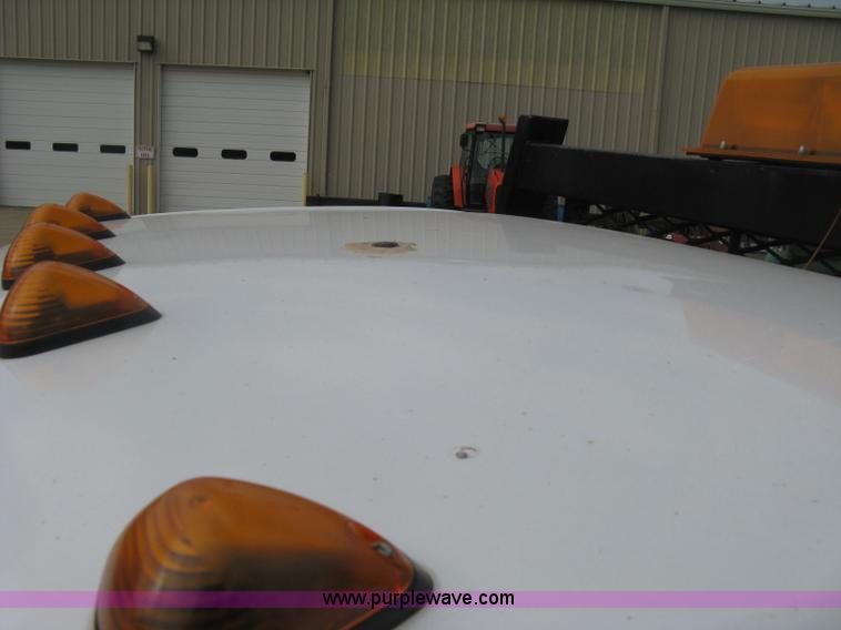 image for item E7877 2000 Ford F450 Super Duty XL flatbed truck