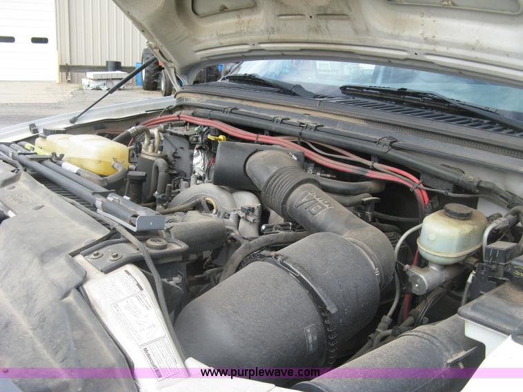 image for item E7877 2000 Ford F450 Super Duty XL flatbed truck