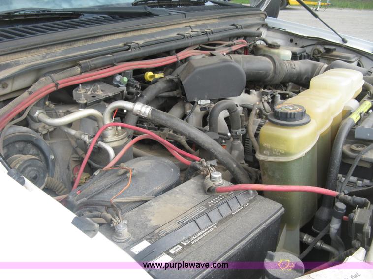 image for item E7877 2000 Ford F450 Super Duty XL flatbed truck