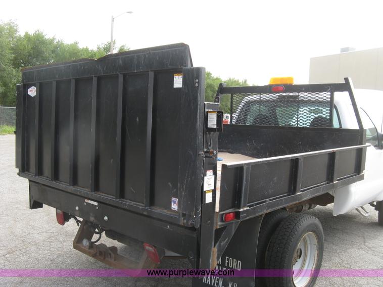 image for item E7877 2000 Ford F450 Super Duty XL flatbed truck