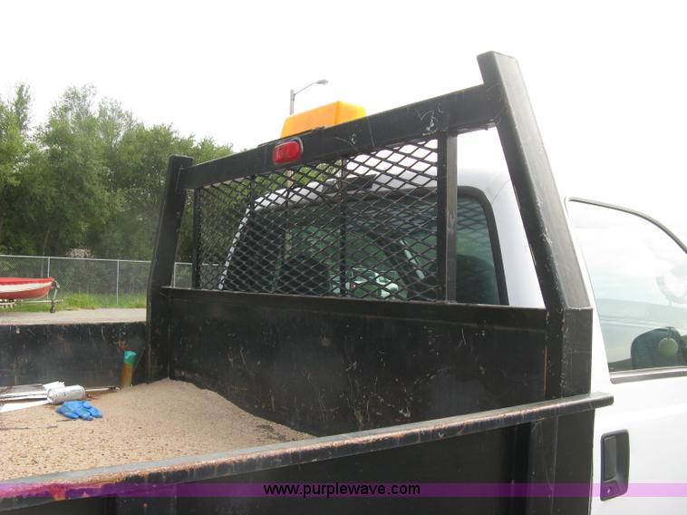 image for item E7877 2000 Ford F450 Super Duty XL flatbed truck