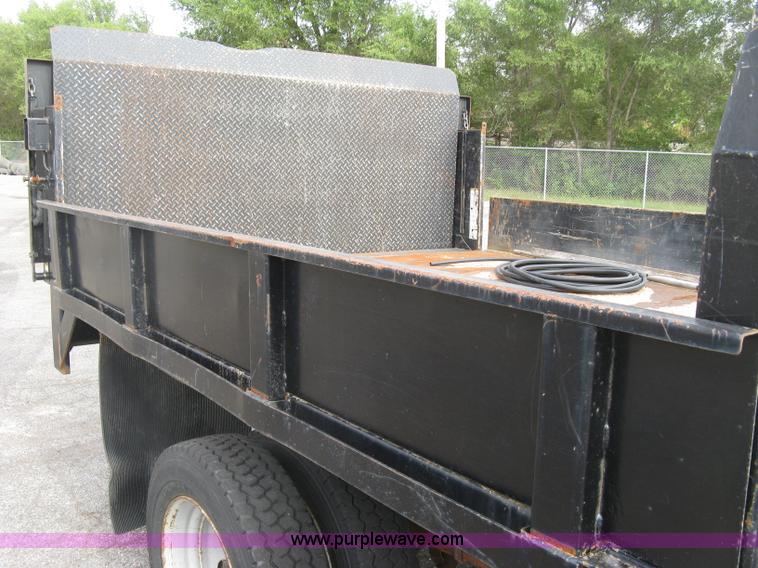 image for item E7877 2000 Ford F450 Super Duty XL flatbed truck