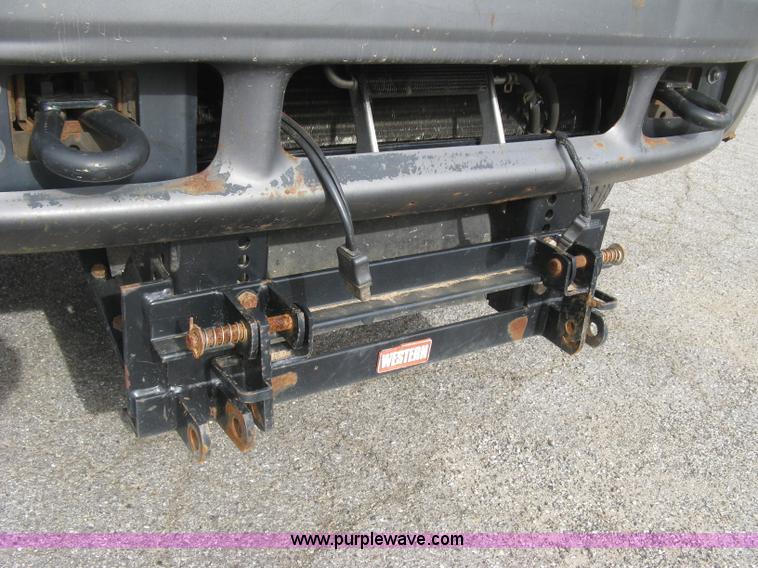 image for item E7877 2000 Ford F450 Super Duty XL flatbed truck