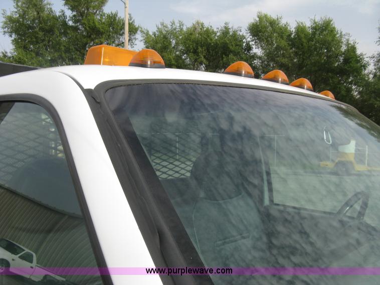 image for item E7877 2000 Ford F450 Super Duty XL flatbed truck