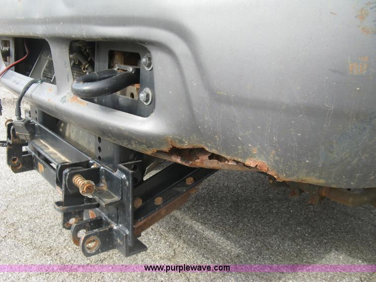 image for item E7877 2000 Ford F450 Super Duty XL flatbed truck